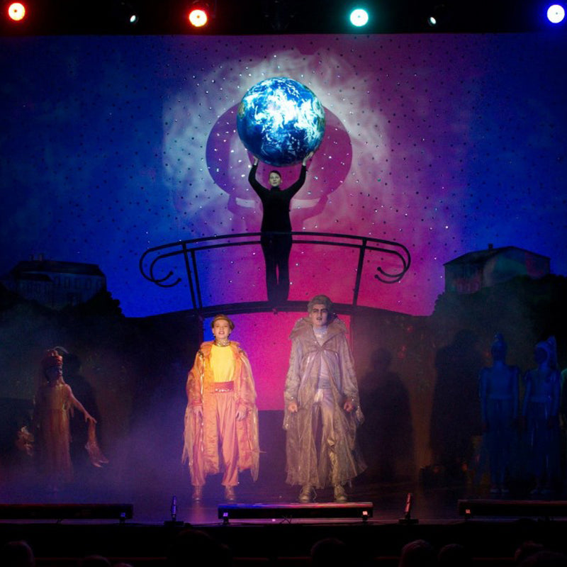 Crowd ball ballon on stage during opera performance
